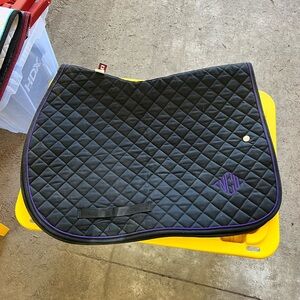 Black Ogilvy saddle pad with purple piping